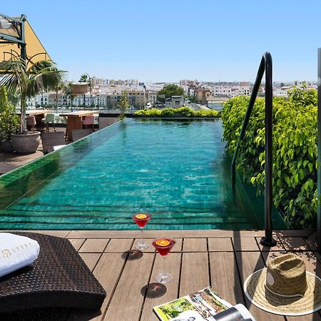 Hotel Lobby Sevilla Exterior foto Rooftop pool