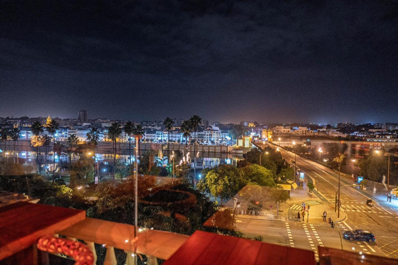 Hotel Lobby Sevilla Exterior foto Rabat at night