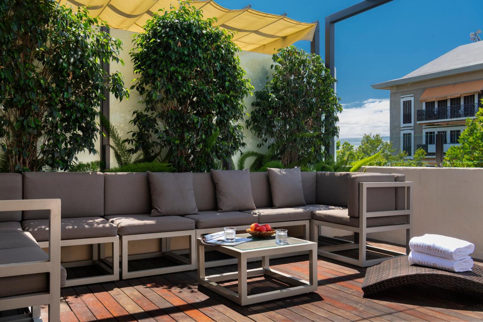 Hotel Lobby Sevilla Exterior foto The hotel's rooftop