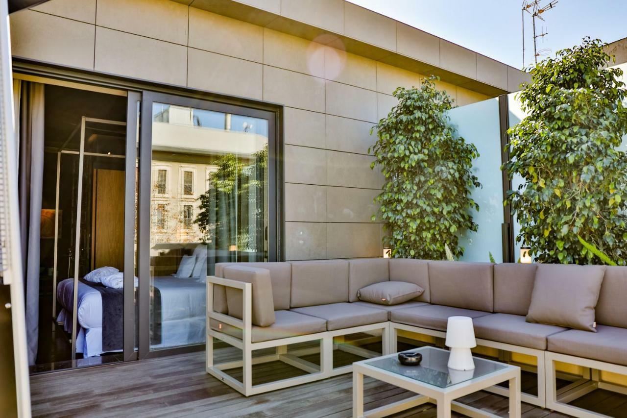 Hotel Lobby Sevilla Exterior foto The hotel's rooftop
